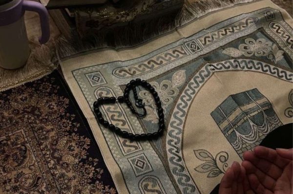 A tasbih on a Prayer mat in the shape of heart; representing self-love