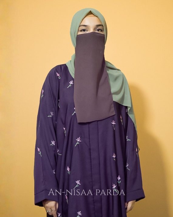 Middle view of flower embroidered gown highlighting front embroidery