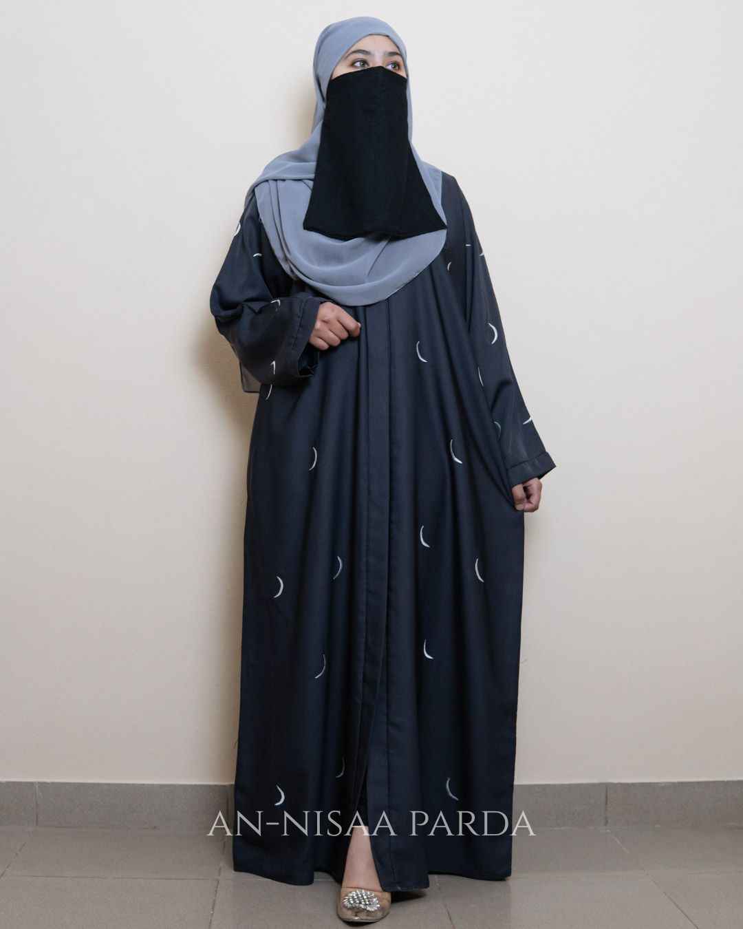 Full-length crescent embroidered gown with simple silhouette