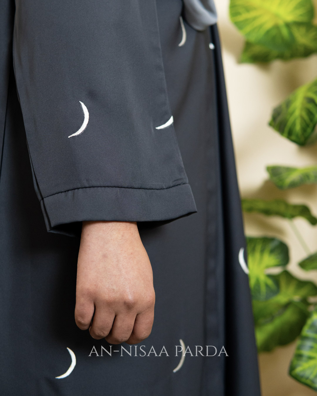 Sleeve Close-up of crescent moon embroidery on Gown