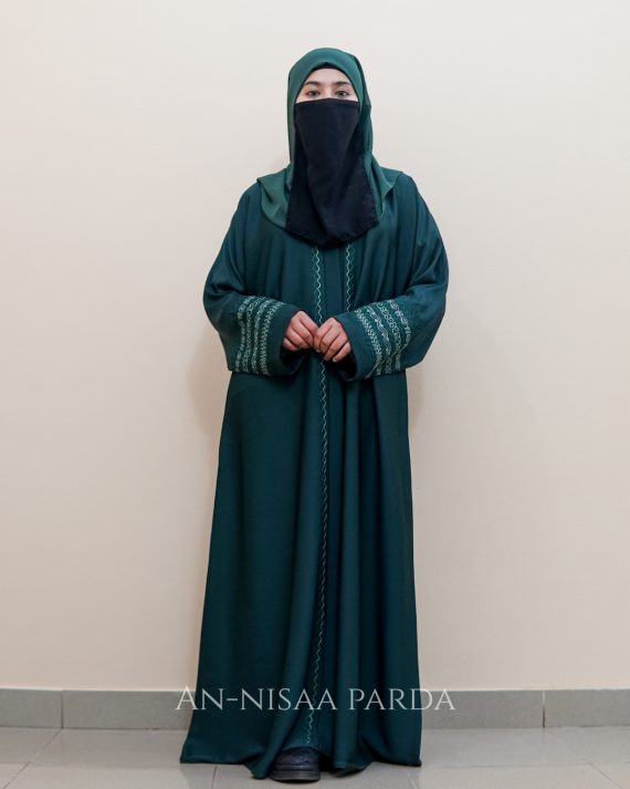 Front view of abaya showing geometric satin embroidery on sleeves